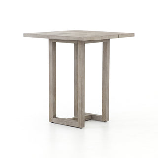 Chris Outdoor Bar Table - GreySimple and streamlined. Weathered grey teak forms clean lines with an open air. Safe for outdoor use. Cover or store indoors during inclement weather and when not in use.