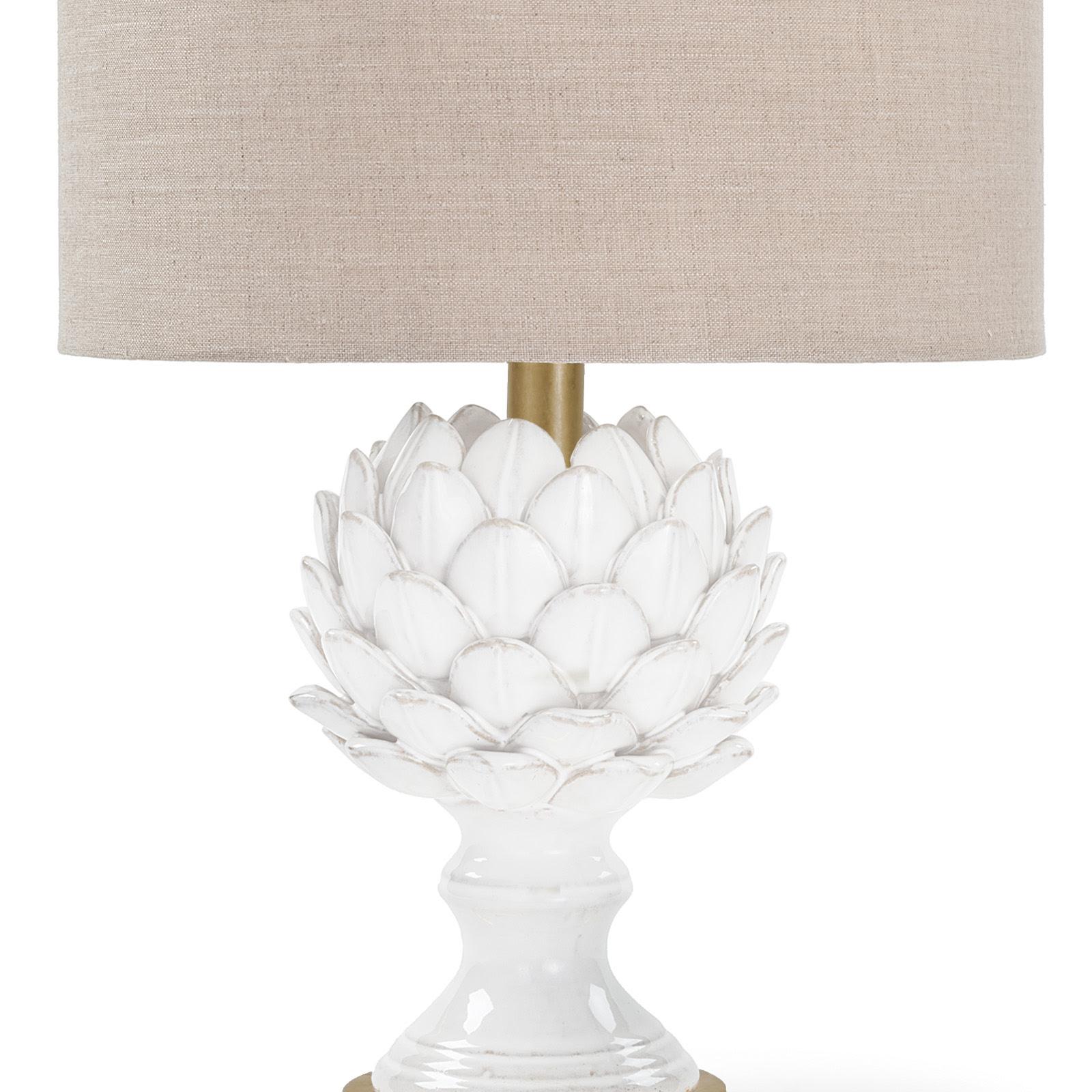 The Leafy Artichoke ceramic table lamp is a beautifully crafted, refined fixture. The soft gold base serves as a sophisticated platform, the textured oatmeal shade tops the classic look.