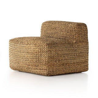 Add a touch of natural style to any room with this softly sculptured chair. Indoor foam cushioning is wrapped in natural woven water hyacinth known for its durability. 
