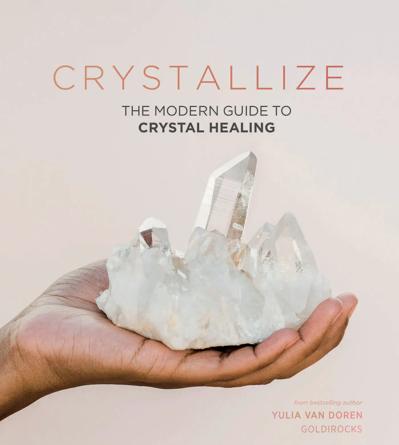Crystallize: The Modern Guide to Crystal Healing inner page showing different crystals and listing out sorting methods: color, sources, chakras, water exposure, magic and notes.