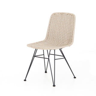 Chair with Neutral armless seating weaves, with black hairpin legs for a modern touch.