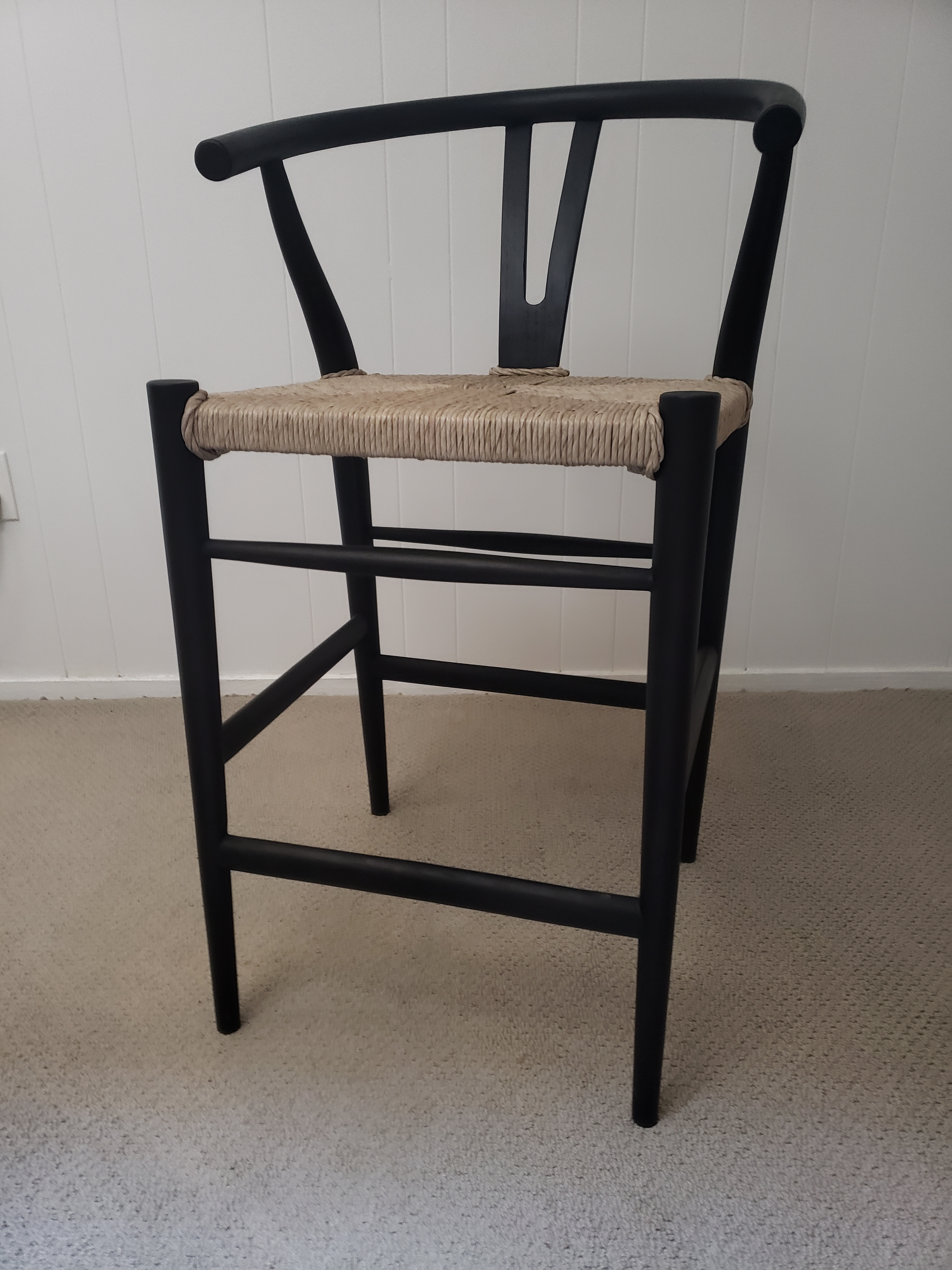Modern curves redefine the classic wishbone-style counter stool. Vintage white all-weather wicker is woven for a dose of fresh texture within weathered grey teak framing. Cover or store indoors during inclement weather and when not in use. 38.5"H.  Overall Dimensions: 21.75"w x 22.50"d x 38.50"h  Local Pick Up or Local Delivery Only. Please call 480-733-6863 for more information.