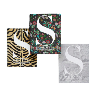 S is for Style set of three books, one book in tiger pattern cover, one book in floral pattern cover and one book cover in gray cloud cover.