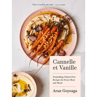 Cannelle et Vanille cookbook cover with plate of rustic cooked carrots and hummus on a marble table.