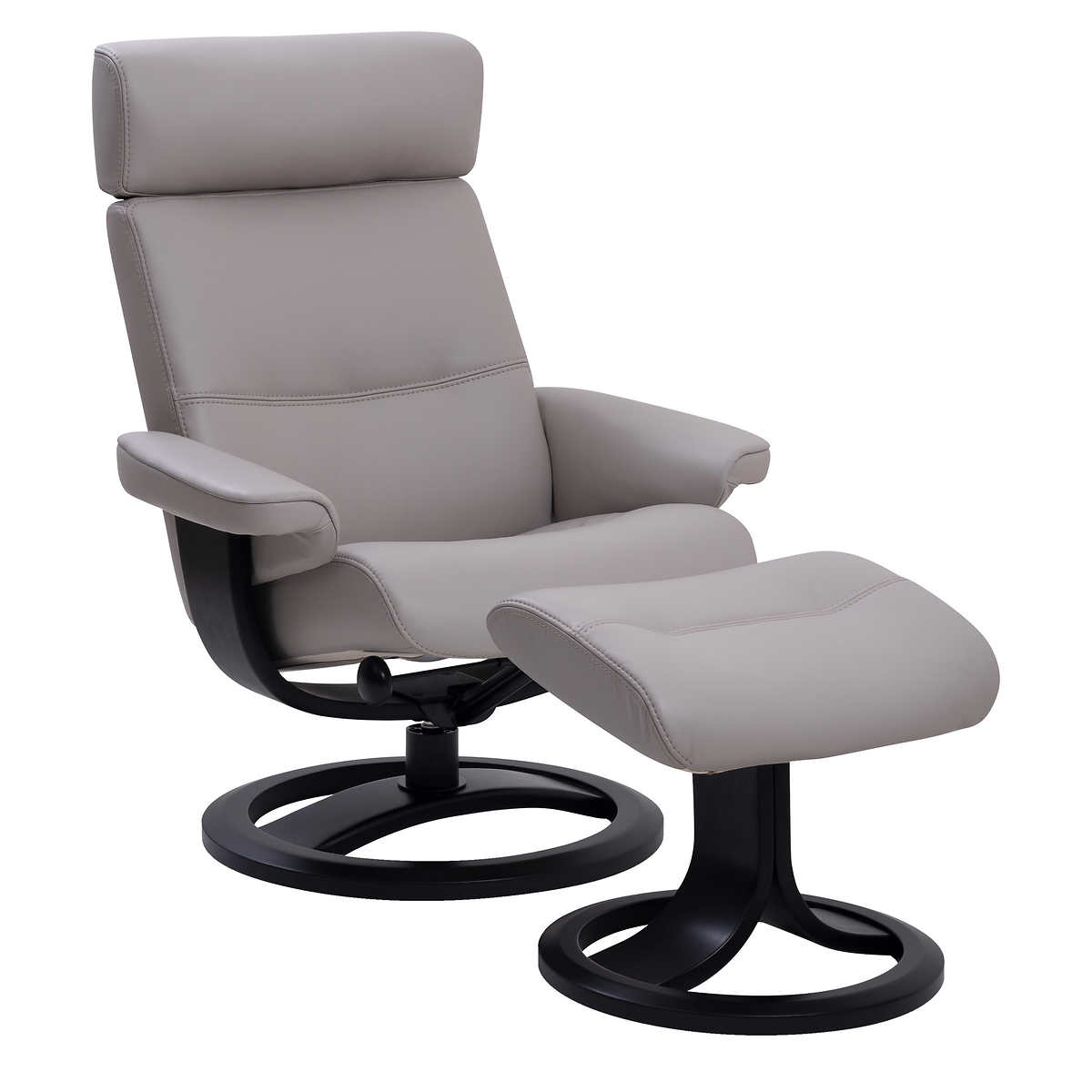 Upholstered in light top-grain leather and paired with a solid ash base, this rounded ottoman