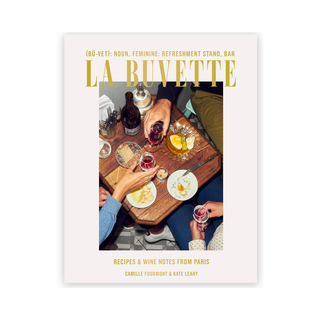 La Buvette: Recipes and Wine Notes from Paris cookbook cover with title in gold with cream cover and picture of a small table with wine and food.